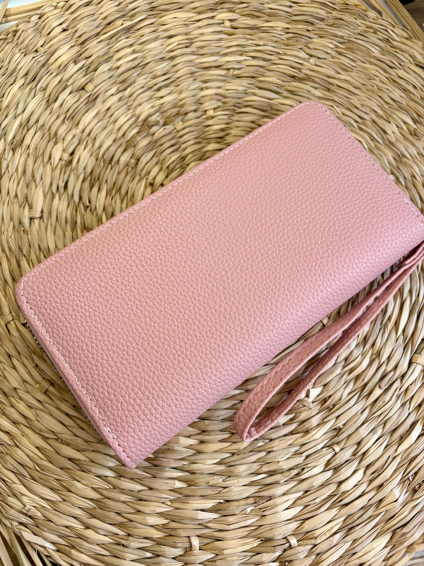 Porte feuille à fermeture éclair rose