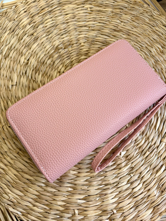 Porte feuille à fermeture éclair rose