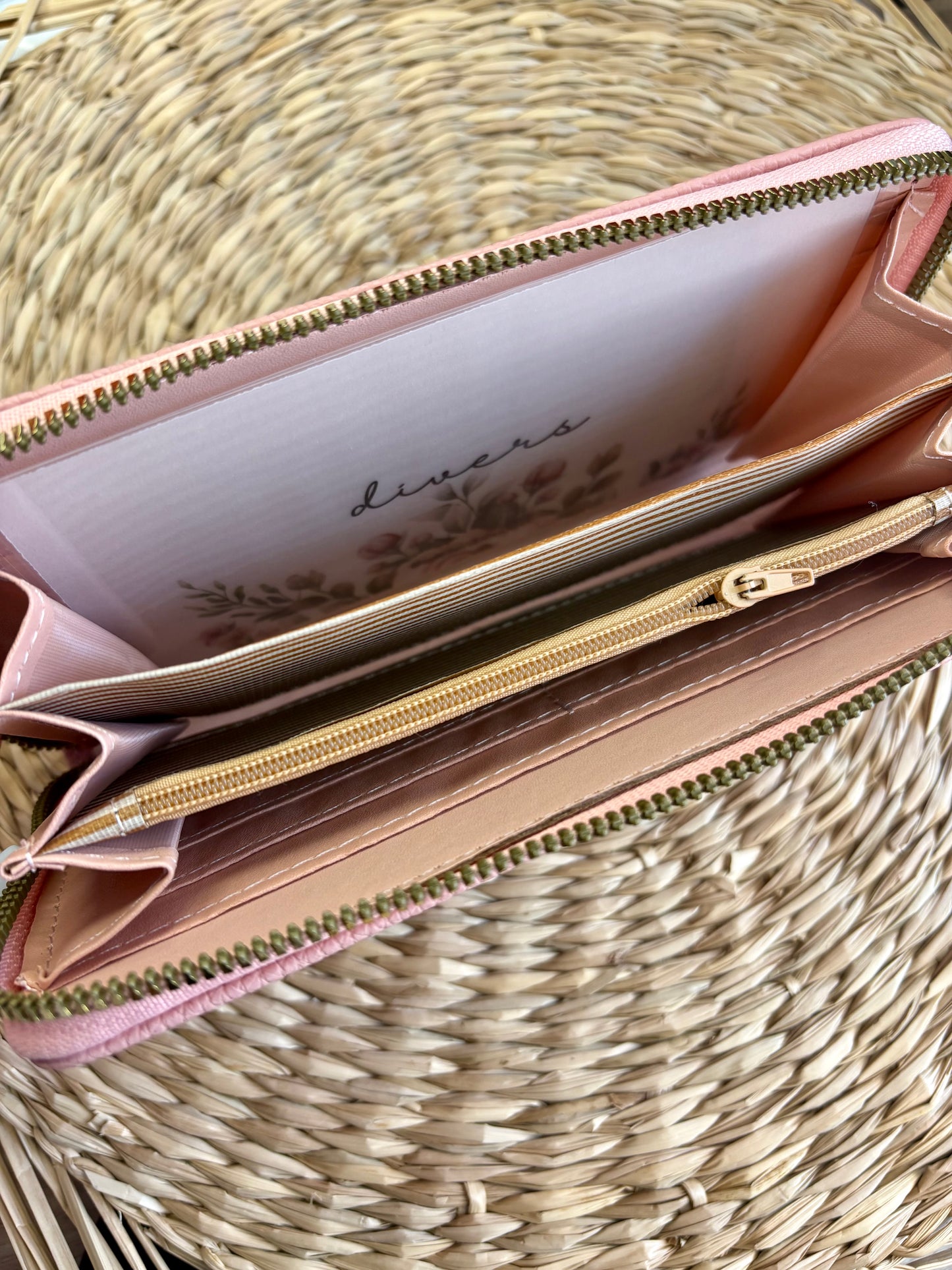 Porte feuille à fermeture éclair rose