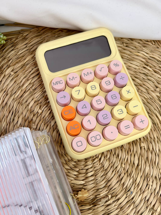 Calculatrice jaune pastel